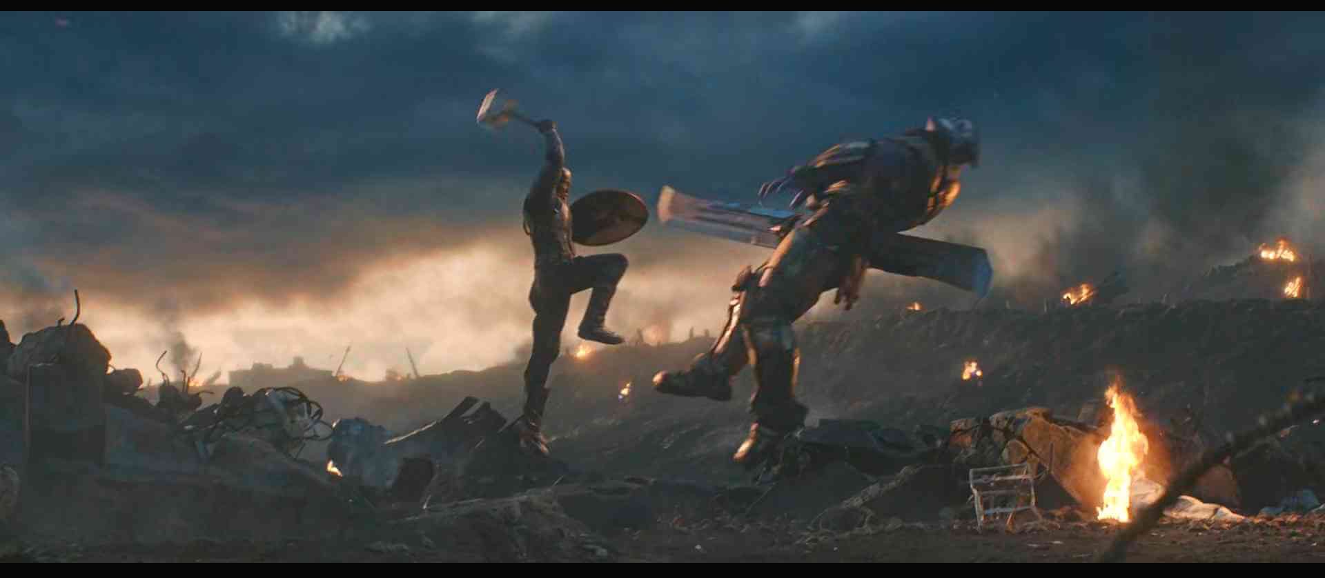 Captain-America-wields-thor-hammer-fighting-thanos-with-his-shield